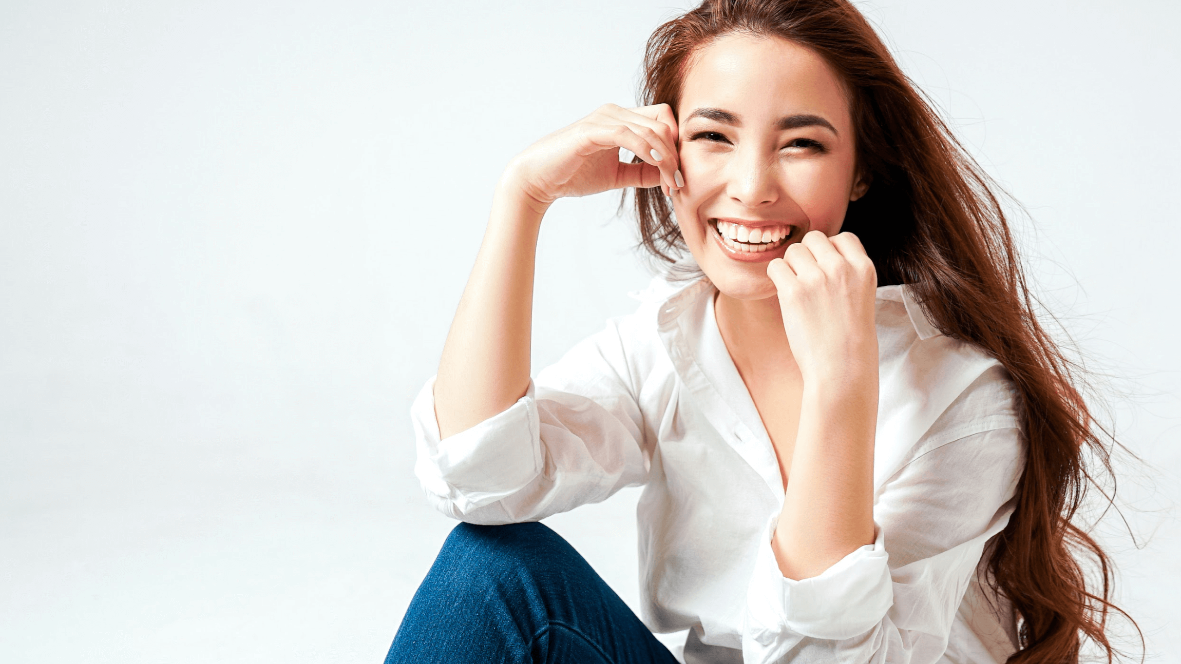 woman sitting and smiling